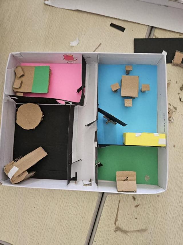 用智慧规划设计用纸板搭建这群学生自己动手创造梦想家园(图1)